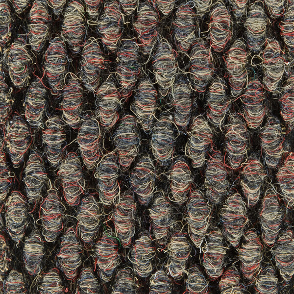 A close up of a Cactus Mat Ultra-Berber carpet with an autumn color pattern.