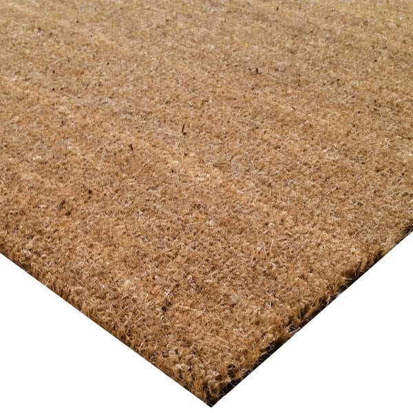 A Cactus Mat natural tan scraper mat with a cocoa brush texture.