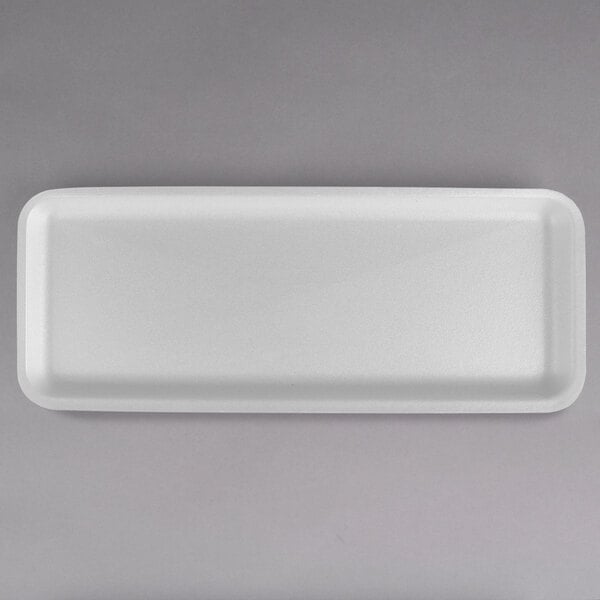 A white rectangular CKF foam meat tray with a handle.