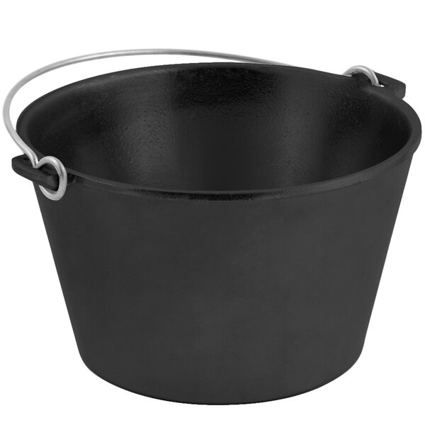 A black metal kettle with a bail handle.