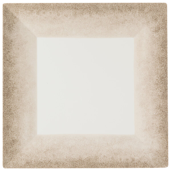 A white square plate with a brown crackle-finished border.