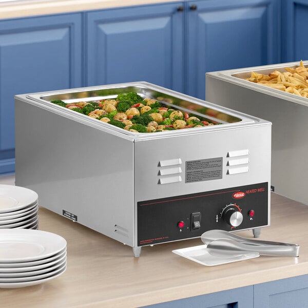 A Hatco countertop food warmer with food in it.