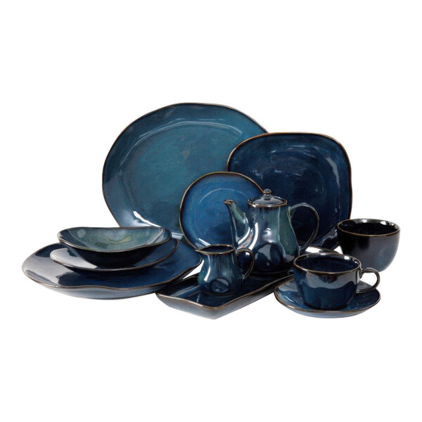 A close-up of a rectangular black bowl with a blue and black night sky design.