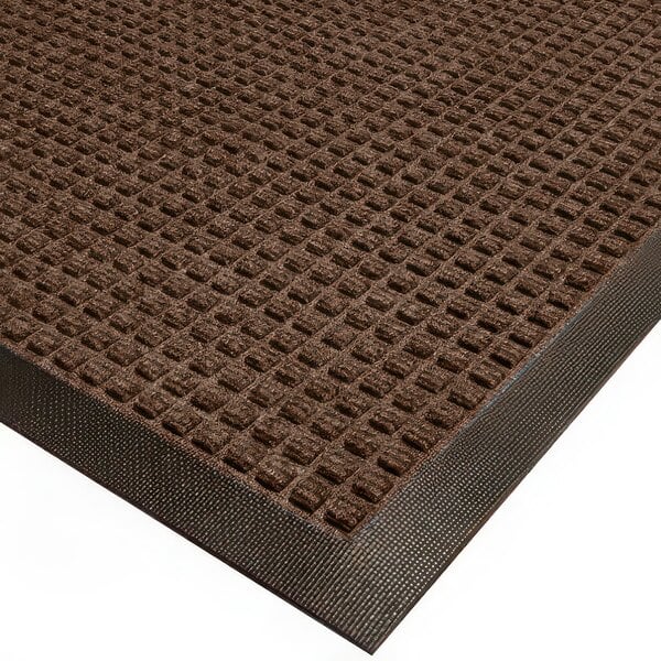 A brown Cactus Mat Water Well Classic Carpet Mat with black squares.