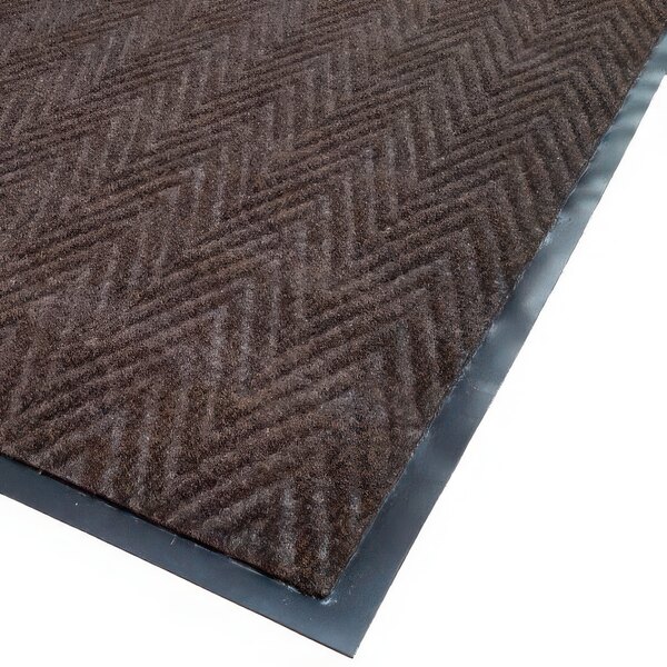 A brown Cactus Mat roll with black trim and a herringbone pattern.