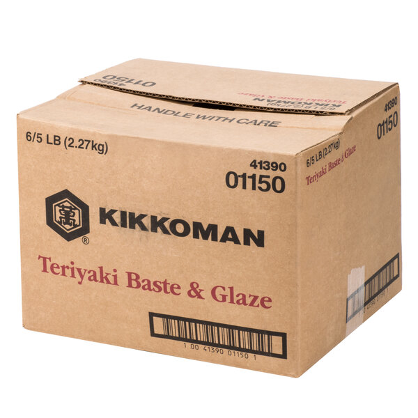 A brown cardboard box with black text for 6 cases of Kikkoman Teriyaki Baste & Glaze.