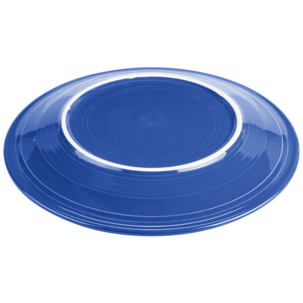 A Fiesta® Lapis chop plate with a white border.