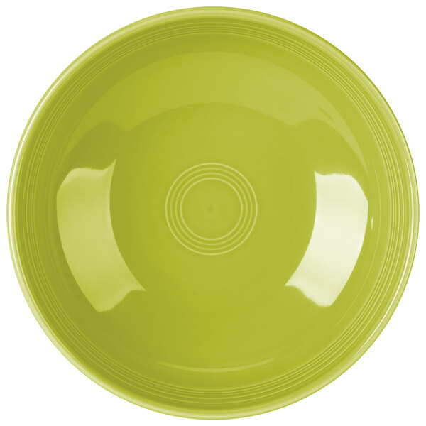 A close-up of a Fiesta Lemongrass large china bistro bowl with a circular pattern in lime green.