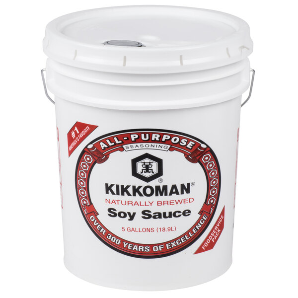 A white Kikkoman bucket with a lid.