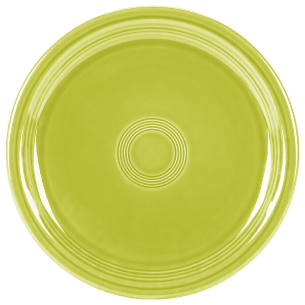 A lemongrass green Fiesta Healthcare China plate with a circular design.