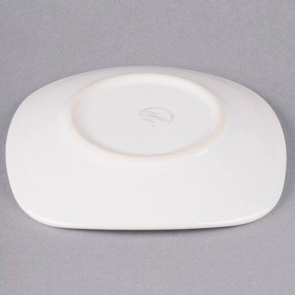 A Fiesta® white china salad plate with a circular edge.