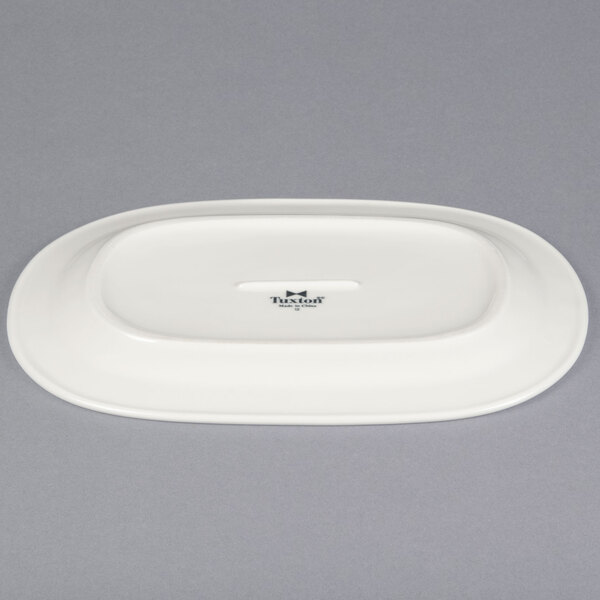 A white oval Tuxton china platter.