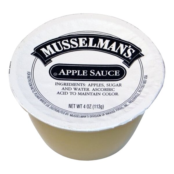 A white container of Musselman's sweetened apple sauce with black text on the label.