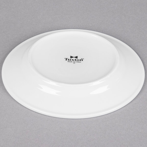 A Tuxton Pacifica bright white china plate with an embossed design.