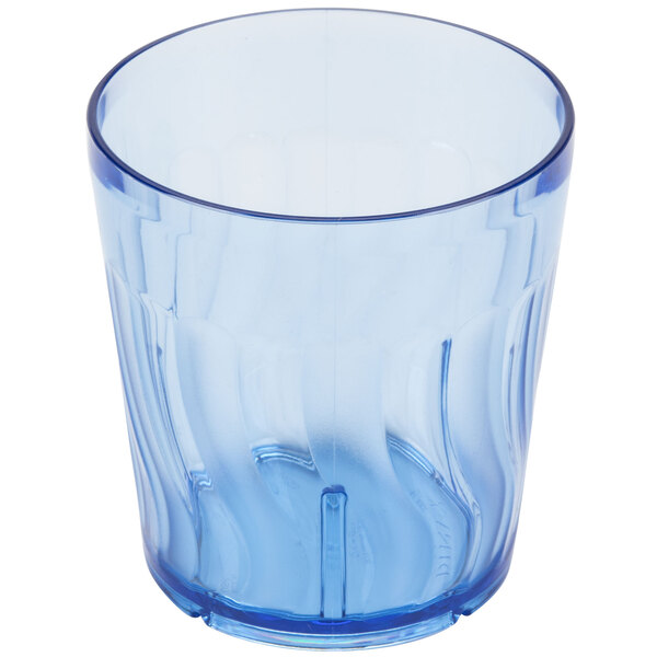 A blue plastic tumbler with a wavy design.