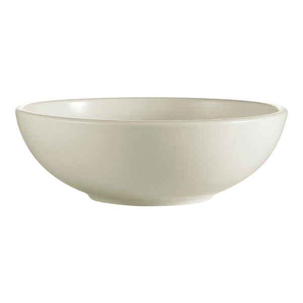 A CAC ivory china pasta bowl with rolled edges.