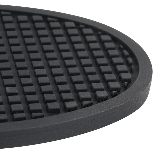 An American Metalcraft black silicone trivet with a grid pattern.