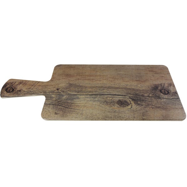 A rectangular faux driftwood serving board with a handle.