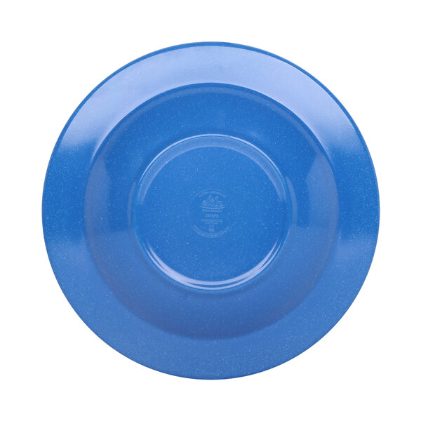 A close-up of a blue bowl with a speckled surface.