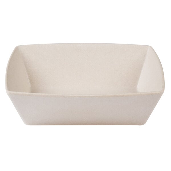 A rectangular papyrus-colored bowl with a curved edge.