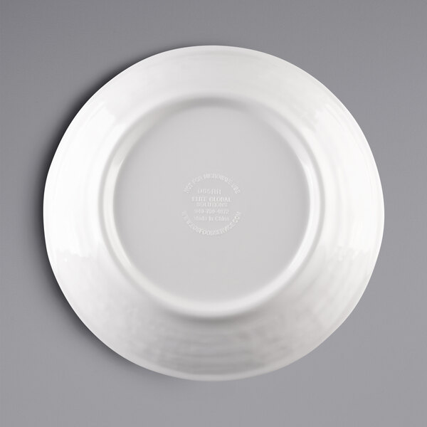 A white Elite Global Solutions Pebble Creek bowl with a circular design on a gray background.