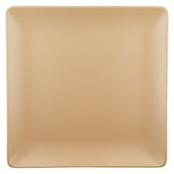 A tan square plate with a white border.