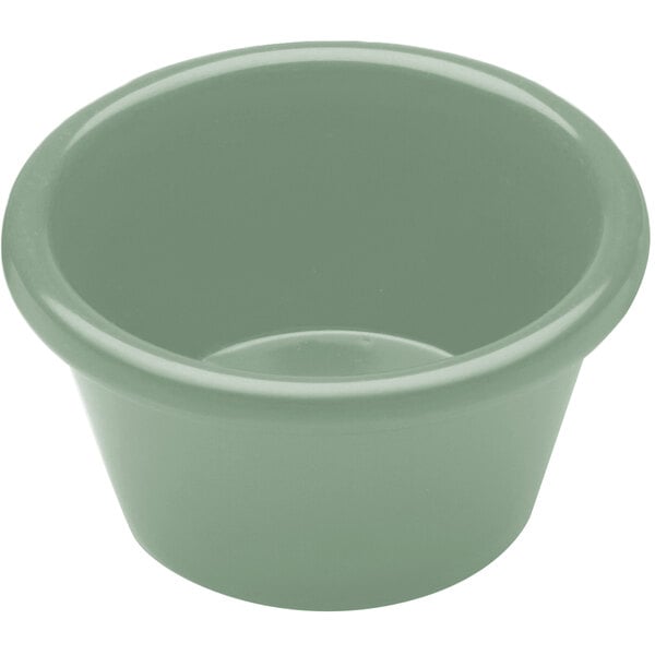 A close-up of a hemlock green Elite Global Solutions melamine ramekin.