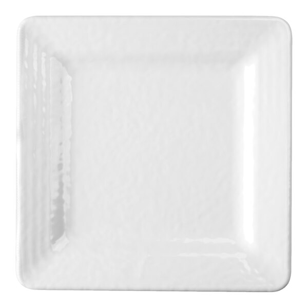 A white square melamine plate with a subtle textured pattern.