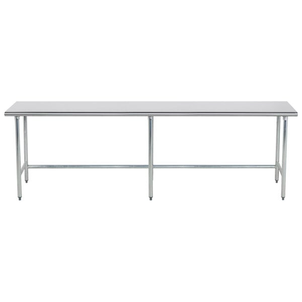 An Advance Tabco stainless steel work table with an open base and metal legs.