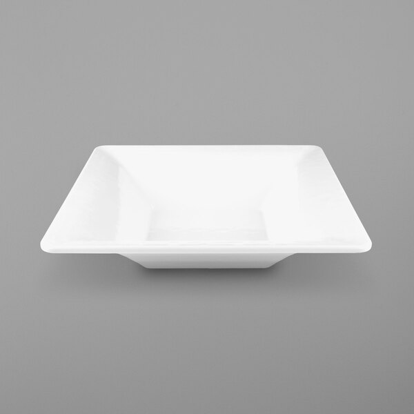 A white square bowl with a pebble texture on a white background.
