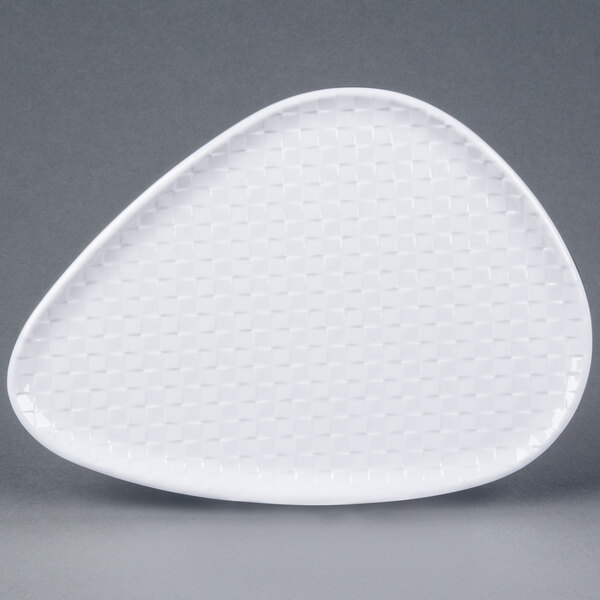 A white GET Coralline triangle melamine plate with a textured pattern.