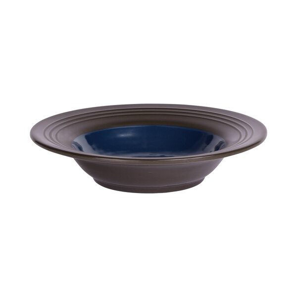 An Elite Global Solutions Durango melamine bowl with a blue inside and brown base.