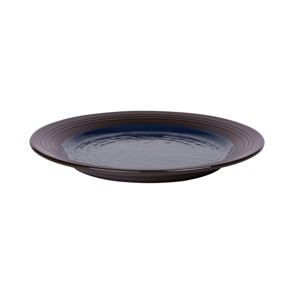 A black melamine plate with a blue rim.