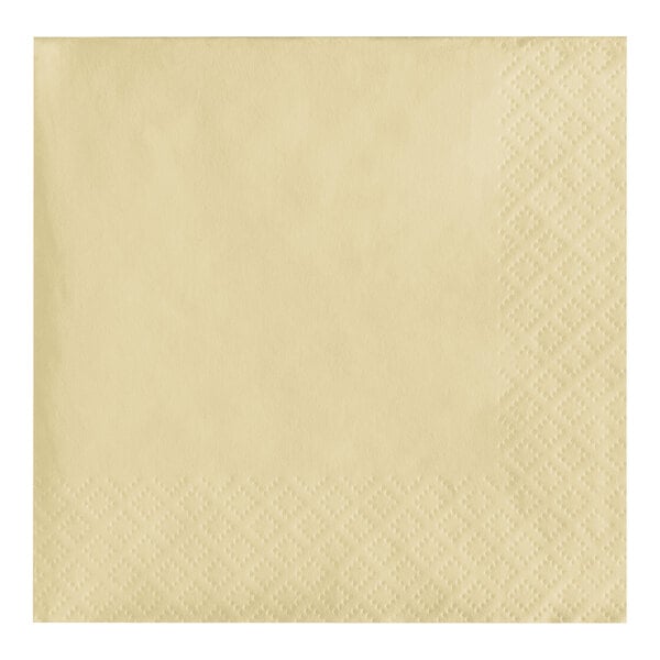 A close up of an ivory Creative Converting beverage napkin with a square design.