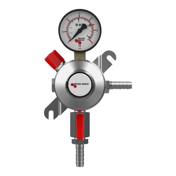 A close-up of a Micro Matic CO2 low-pressure regulator with a red gauge.