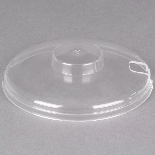 A clear plastic lid with a white strap for a Carlisle cold crock.