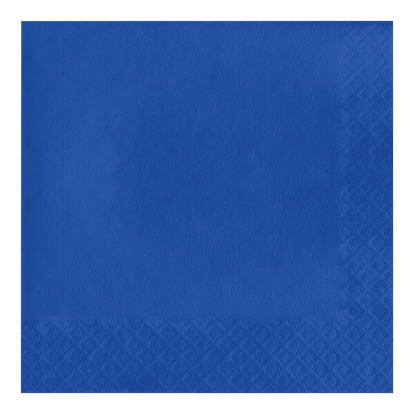 A blue napkin with a diamond pattern on a white surface.