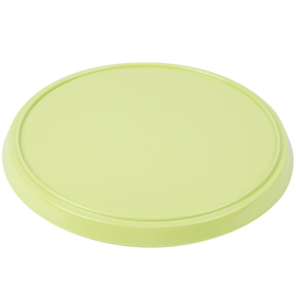 A green circular lid on a white background.
