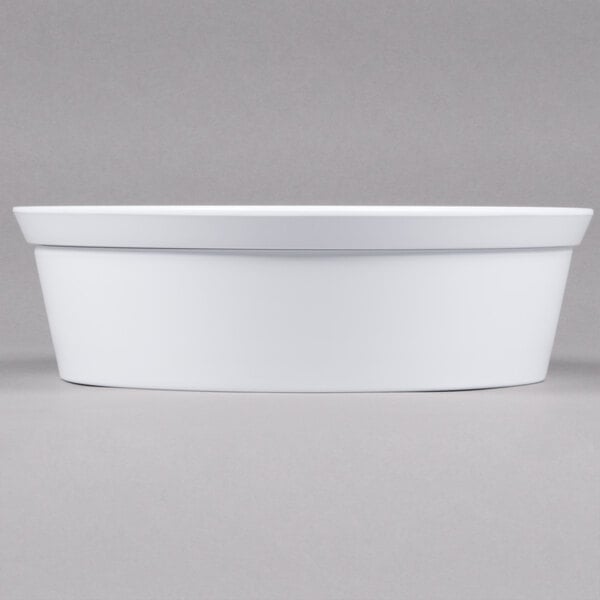 A white melamine bowl inside a white box.