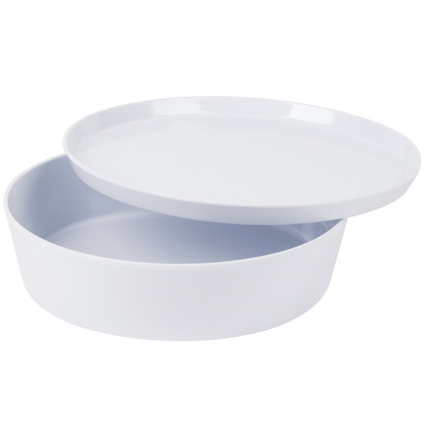 A round white container with a matching lid, shown partially open.