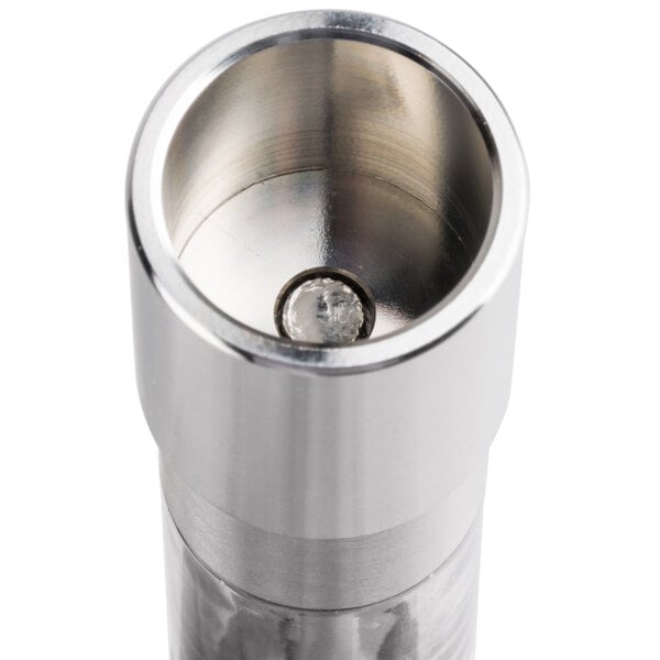 A close-up of the American Metalcraft stainless steel Presto Push salt and pepper mill.