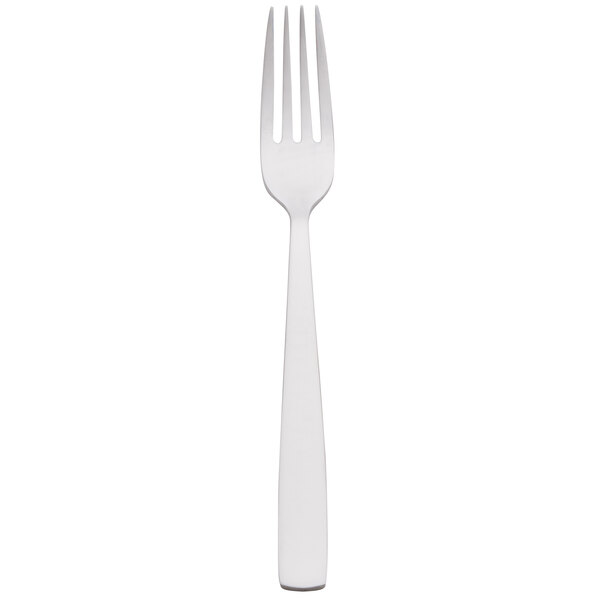 An Arcoroc stainless steel dinner fork with a white handle.