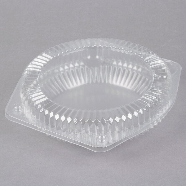 A Polar Pak clear plastic pie container with a low dome lid.