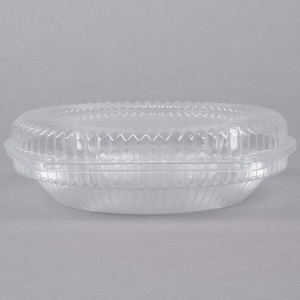 A Polar Pak clear plastic pie container with a low dome lid.