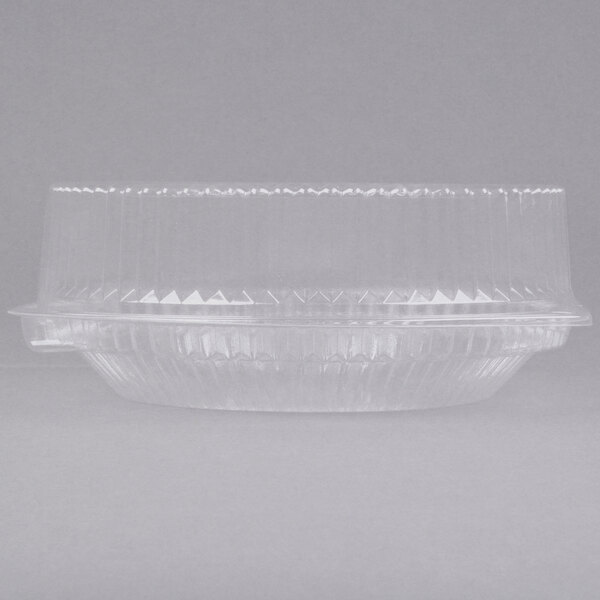 A clear plastic Polar Pak pie container with a high dome lid.