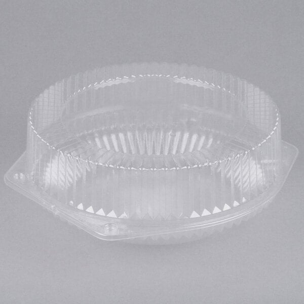 A Polar Pak clear plastic pie container with a high dome lid.