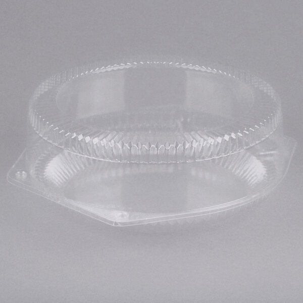 A Polar Pak clear plastic pie container with a high dome lid.