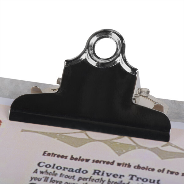 A Menu Solutions Alumitique aluminum clipboard with a black and silver clip.