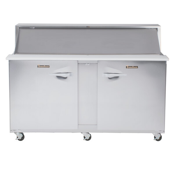 A Traulsen stainless steel refrigerated sandwich prep table with two doors.
