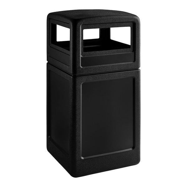 A black rectangular Commercial Zone waste container with a black lid.
